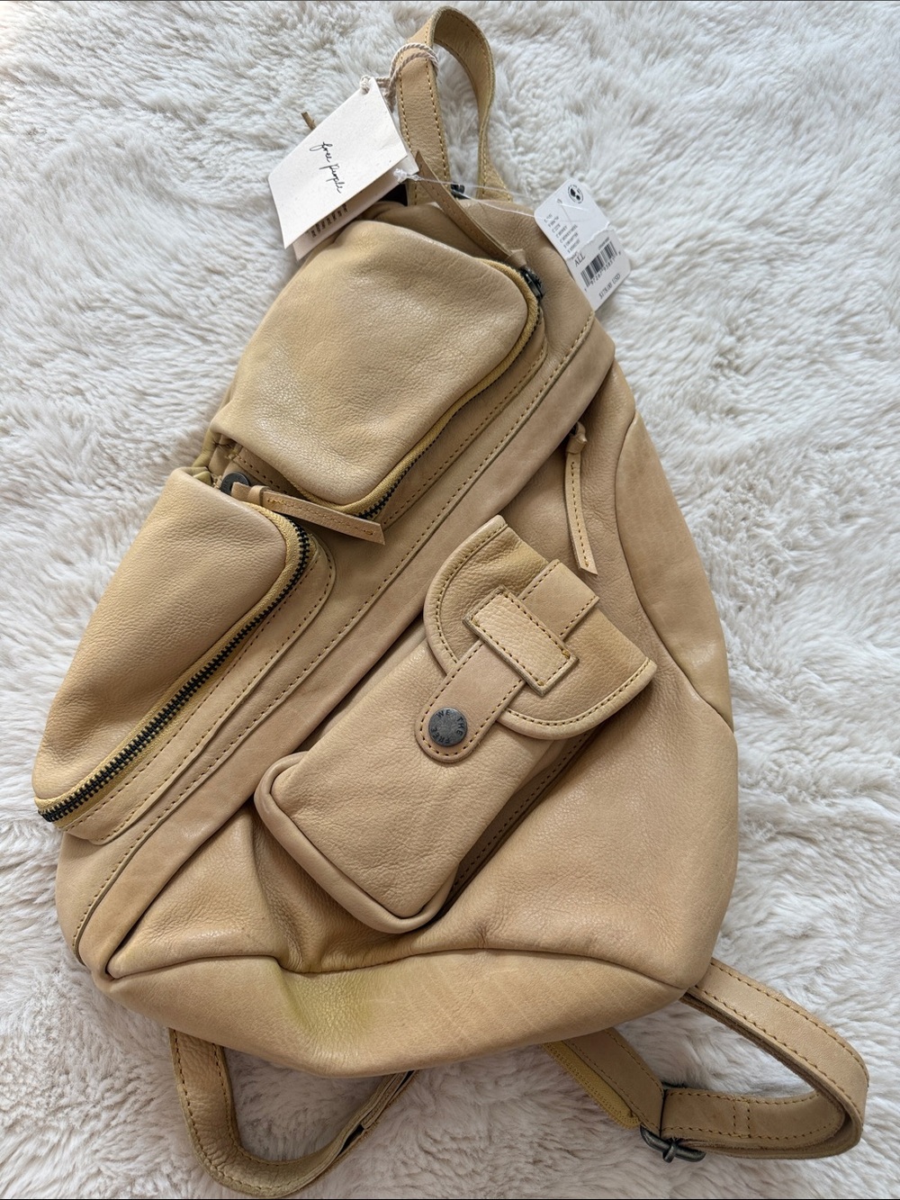 We The Free Beige Leather Sling Backpack with Front Pockets